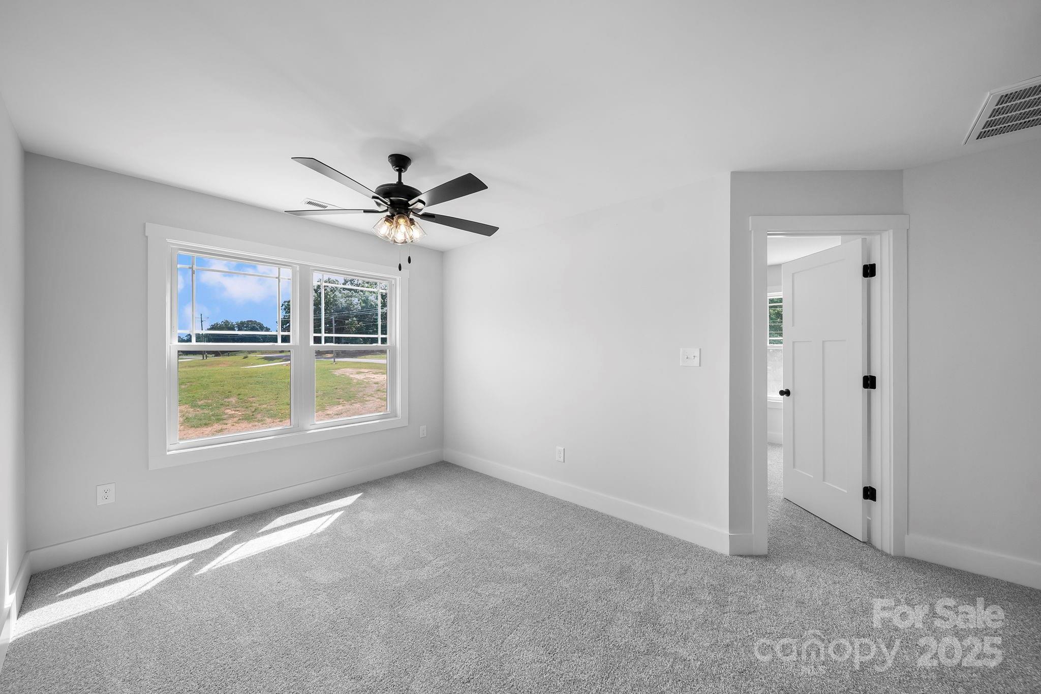 1312 Austin Chaney Road Wingate, NC 28174 - Photo 28 of 47 a view of an empty room with a window