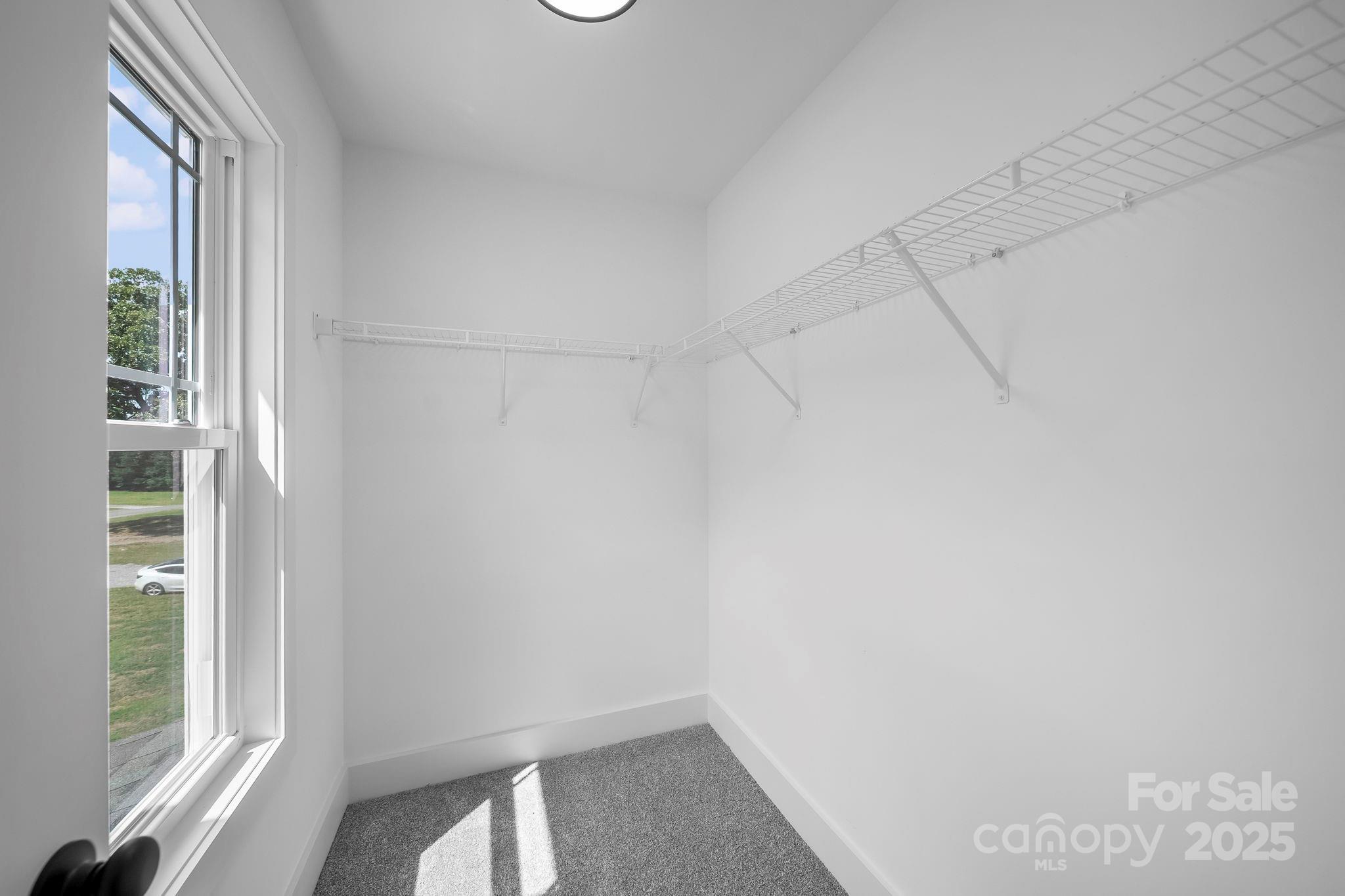 1312 Austin Chaney Road Wingate, NC 28174 - Photo 32 of 47 a view of a small space with windows