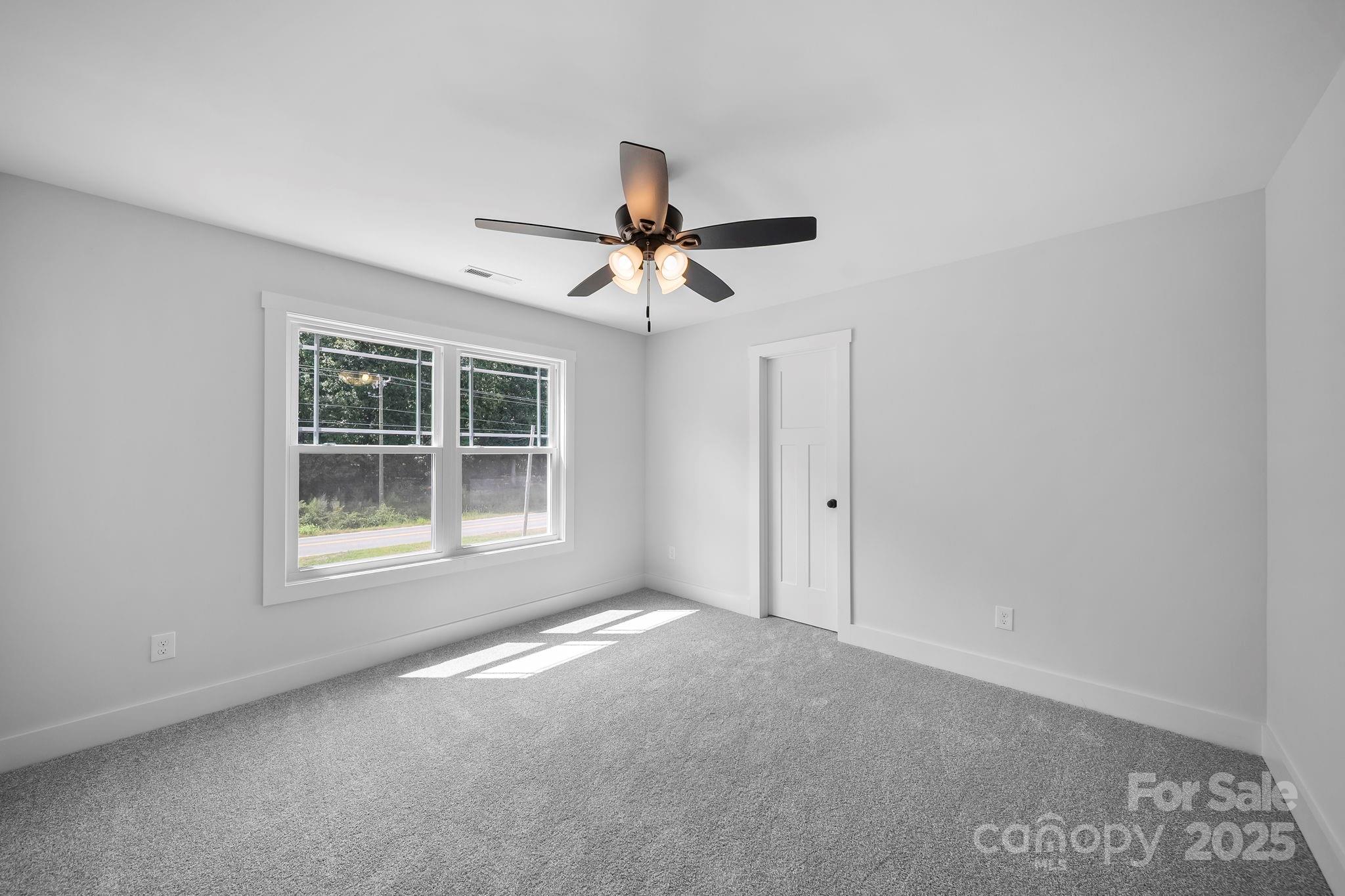 1312 Austin Chaney Road Wingate, NC 28174 - Photo 34 of 47 a view of an empty room with a window
