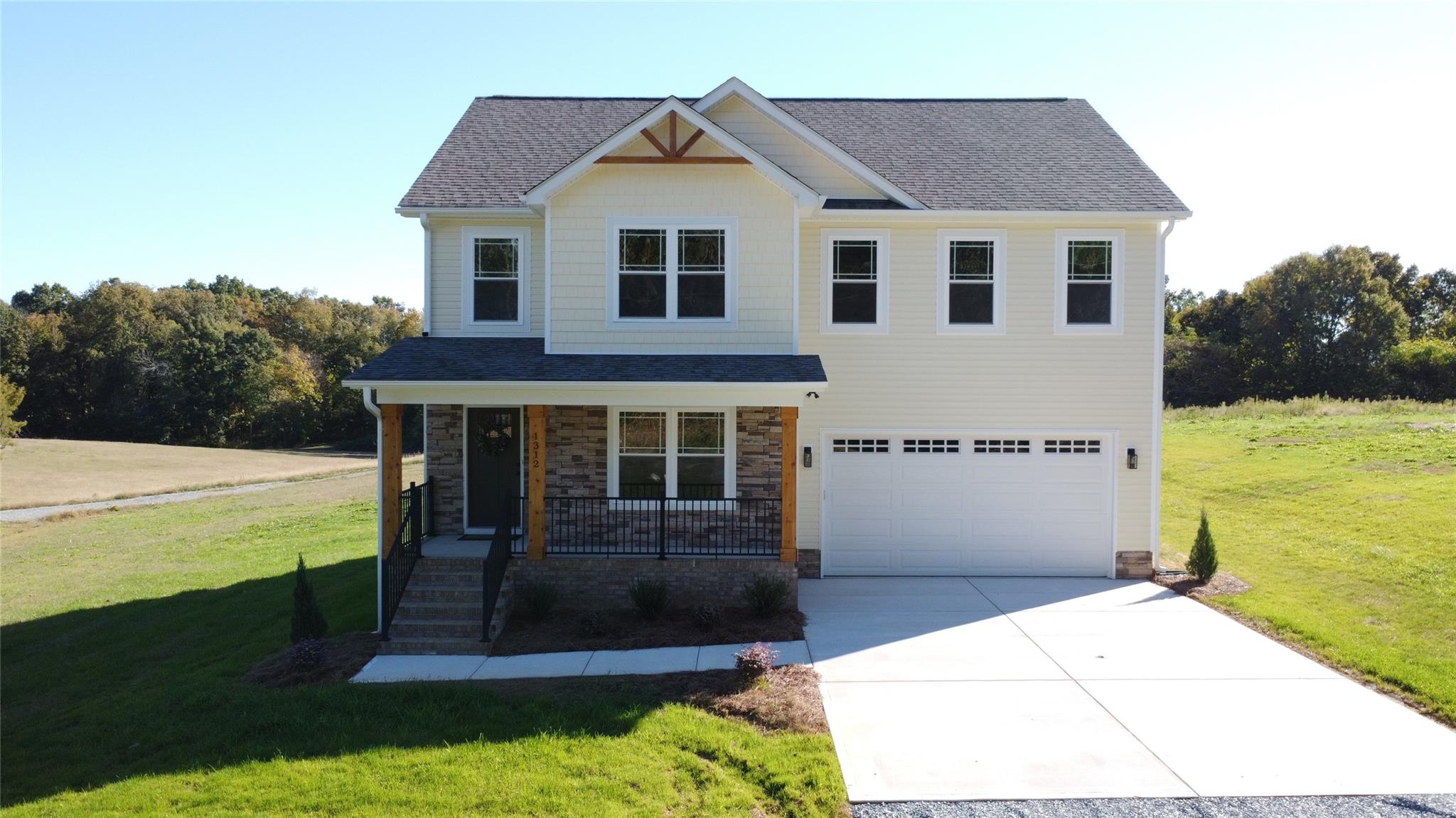 1312 Austin Chaney Road Wingate, NC 28174 - Photo 39 of 47 a front view of a house with a yard