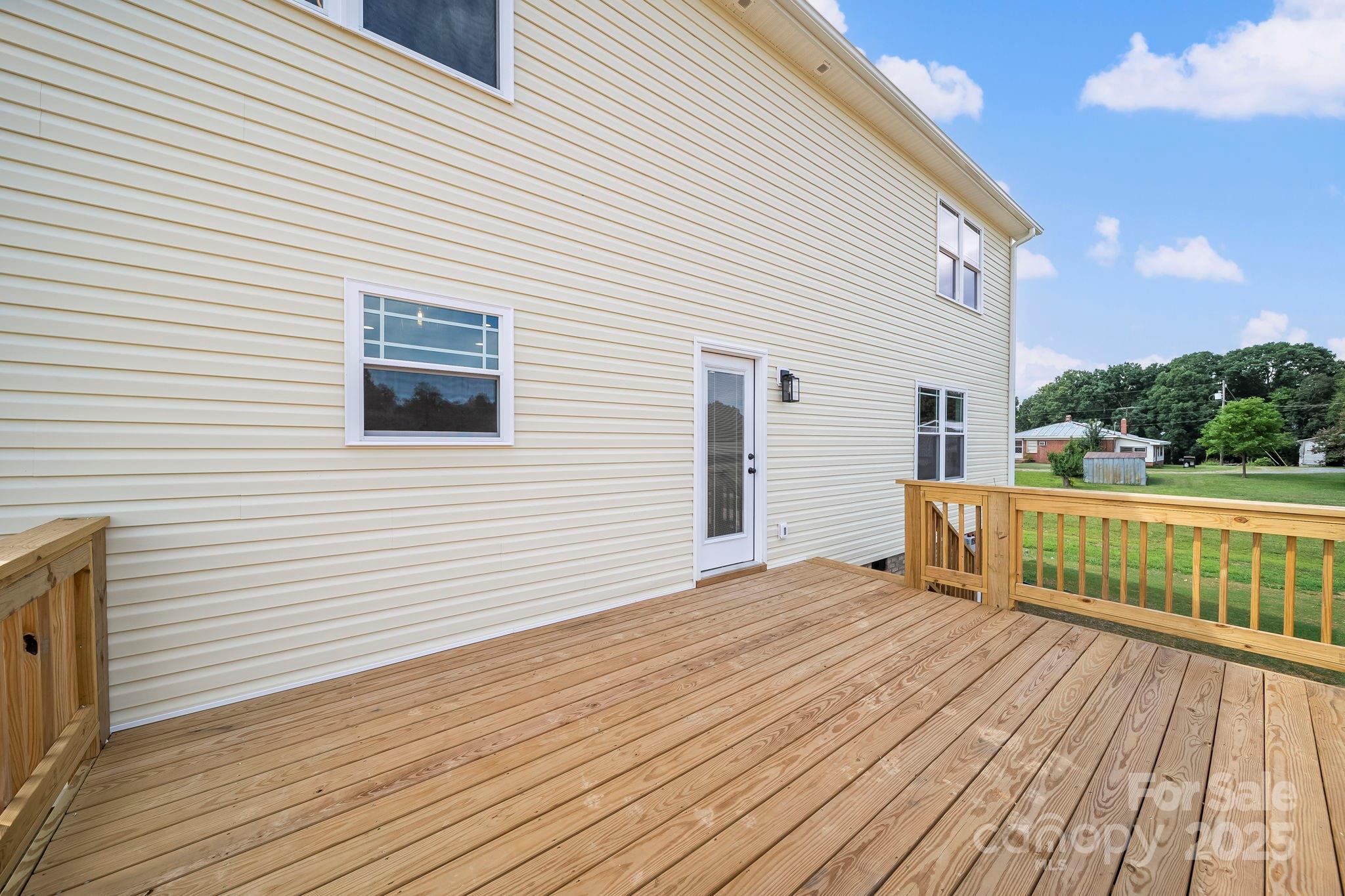 1312 Austin Chaney Road Wingate, NC 28174 - Photo 41 of 47 a view of a house with wooden deck