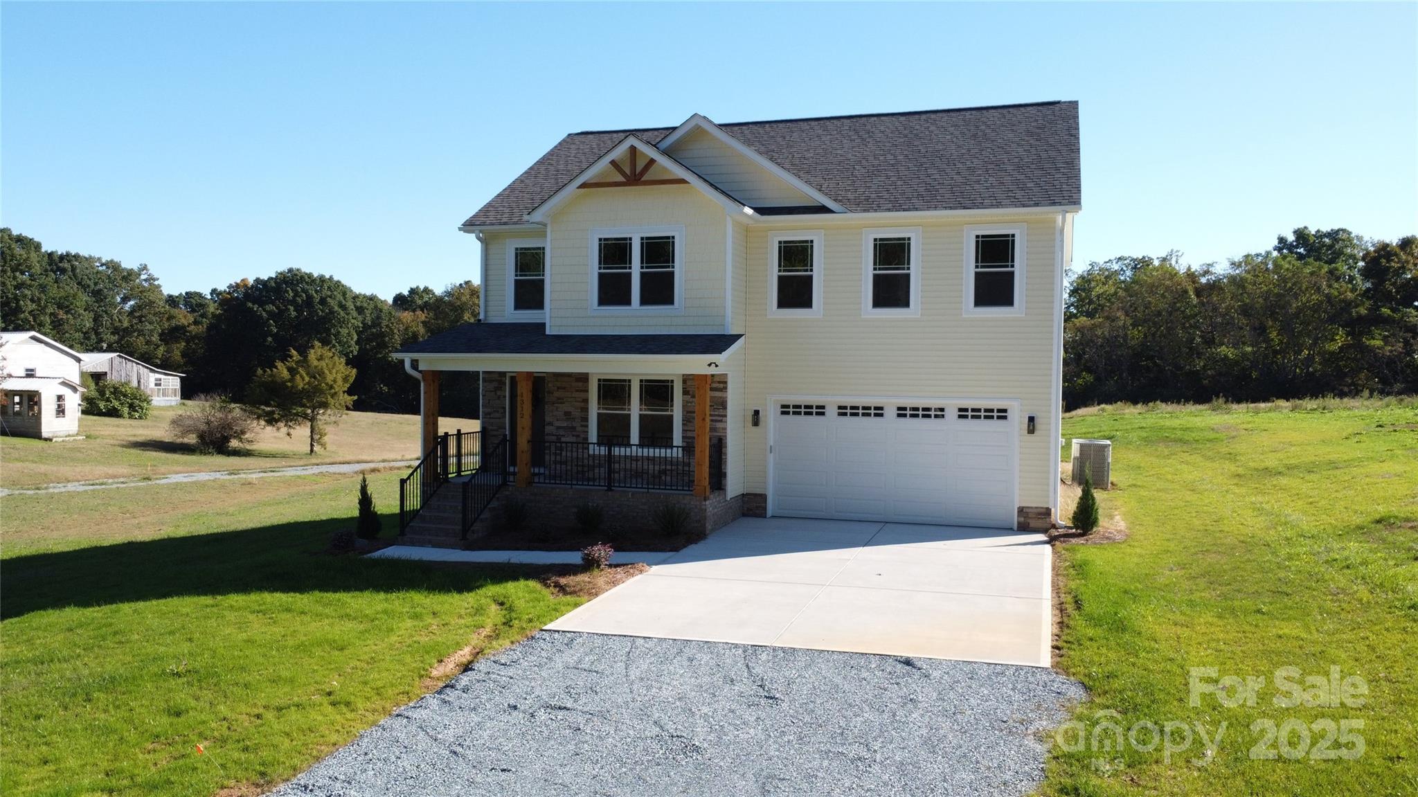 1312 Austin Chaney Road Wingate, NC 28174 - Photo 45 of 47 a front view of a house with a yard