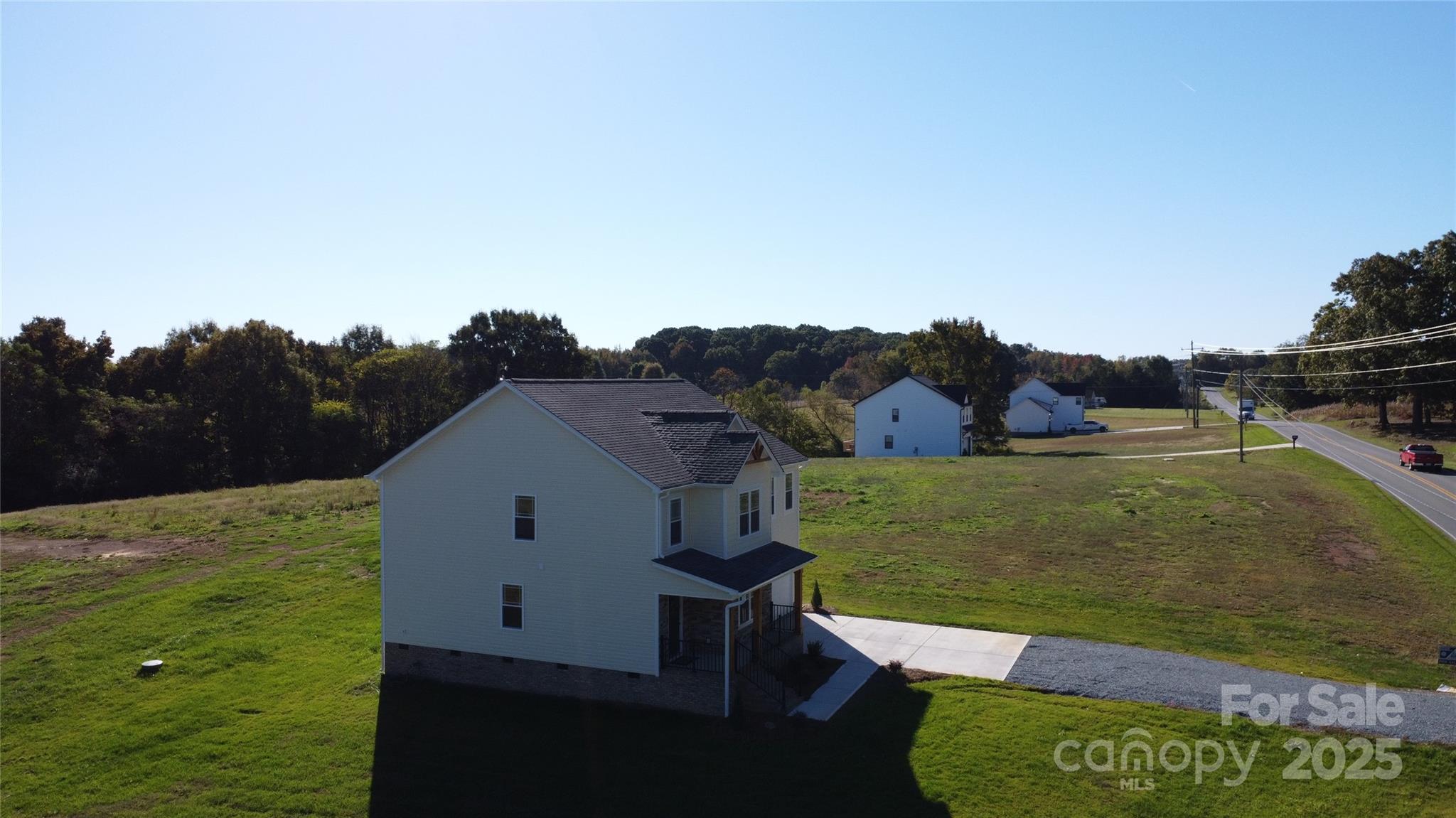 1312 Austin Chaney Road Wingate, NC 28174 - Photo 47 of 47 a view of a house with a yard