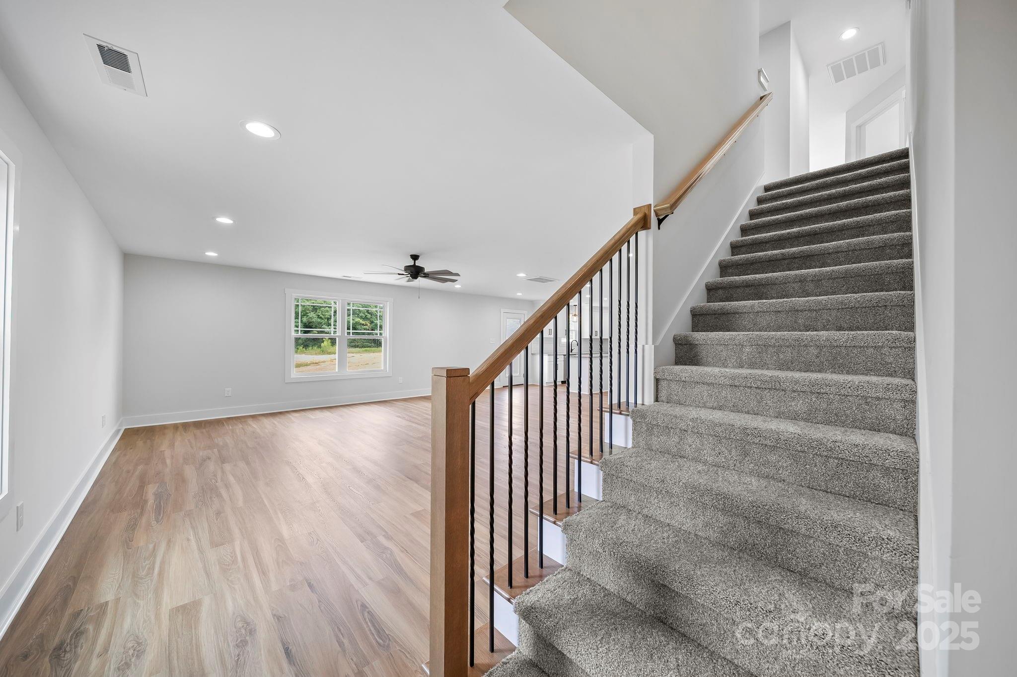 1312 Austin Chaney Road Wingate, NC 28174 - Photo 9 of 47 a view of an entryway with wooden floor