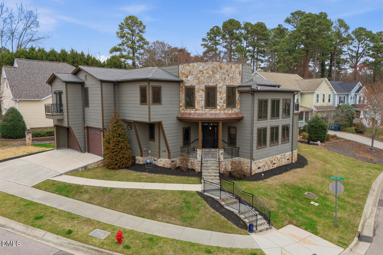 3315 Denada Path Durham, NC 27707 - Photo 61 of 74 a front view of a house with a yard