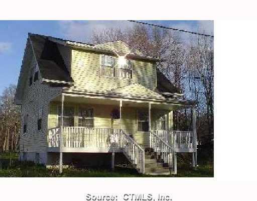 4 Lyman Lane Bloomfield, CT 06002 - Photo 1 of 1 a black and white photo of a house