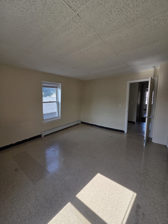 2038-2046 Main Street, Unit 2 Three Rivers, MA 01080 - Photo 11 of 18 an empty room with a window