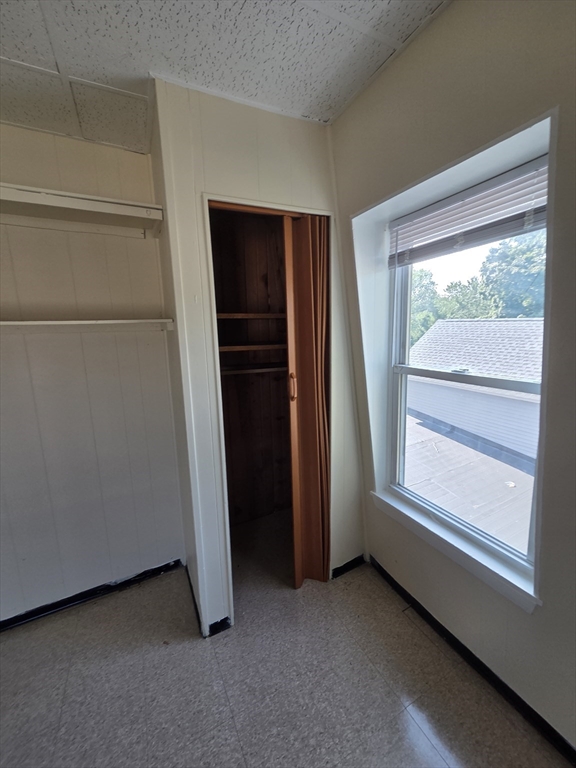 2038-2046 Main Street, Unit 2 Three Rivers, MA 01080 - Photo 15 of 18 a view of an empty room with a window