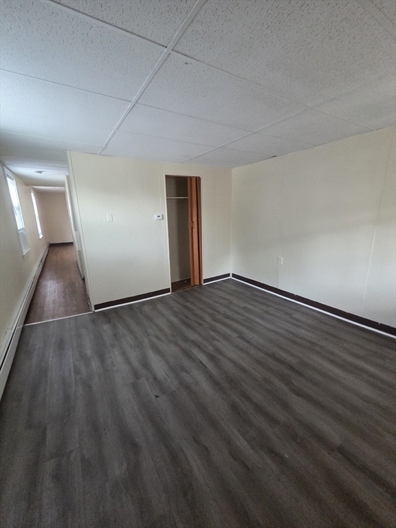 2038-2046 Main Street, Unit 2 Three Rivers, MA 01080 - Photo 17 of 18 a view of an empty room and wooden floor