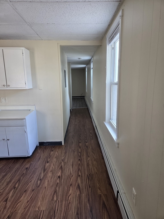 2038-2046 Main Street, Unit 2 Three Rivers, MA 01080 - Photo 2 of 18 a view of a room with wooden floor and cabinet