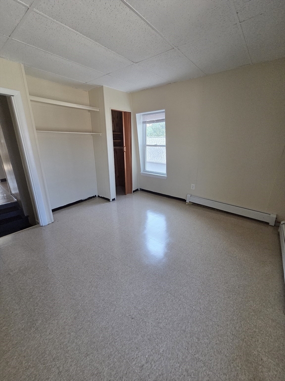 2038-2046 Main Street, Unit 2 Three Rivers, MA 01080 - Photo 6 of 18 a view of a livingroom with an empty space and a window