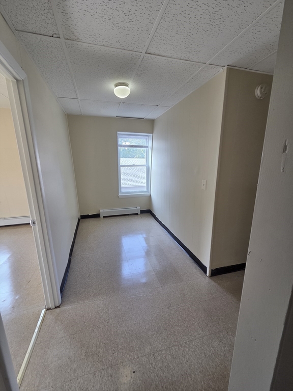 2038-2046 Main Street, Unit 2 Three Rivers, MA 01080 - Photo 8 of 18 an empty room with windows