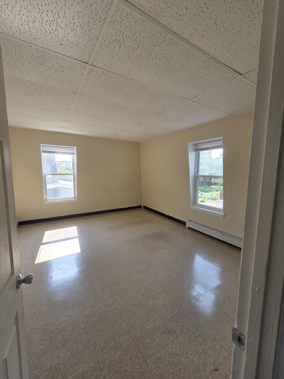 2038-2046 Main Street, Unit 2 Three Rivers, MA 01080 - Photo 9 of 18 an empty room with a window