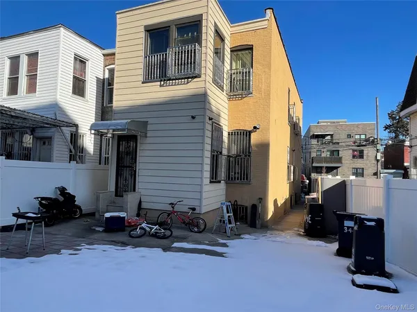 a view of a patio with storage and utility