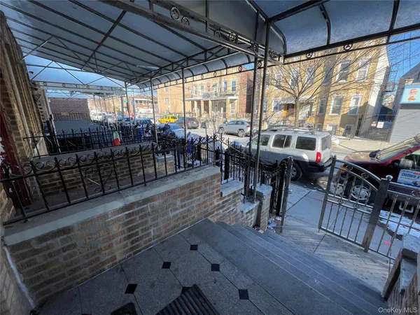 a view of a porch with furniture