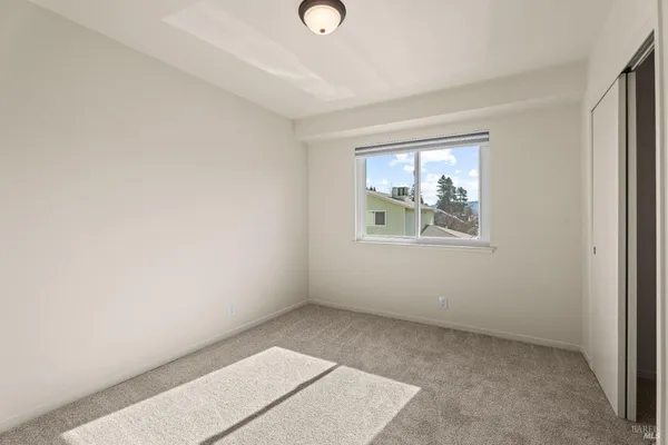 a bathroom with white walls