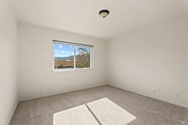 an empty room with a window