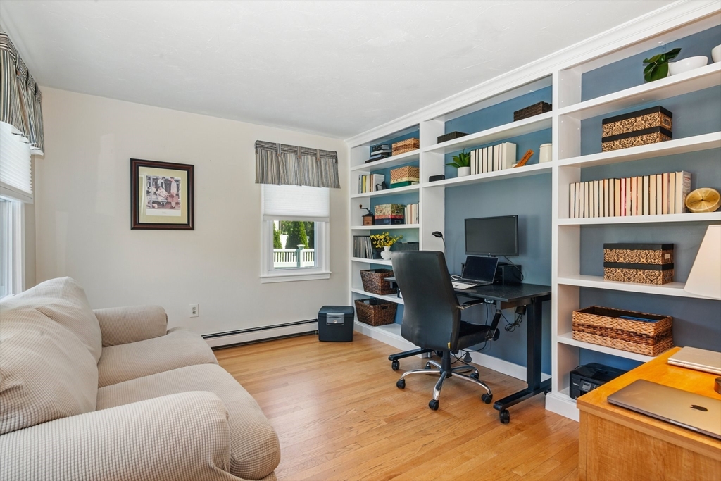 6 Wight Farm Road Natick, MA 01760 - Photo 11 of 37 a view of a livingroom with workspace and a couch