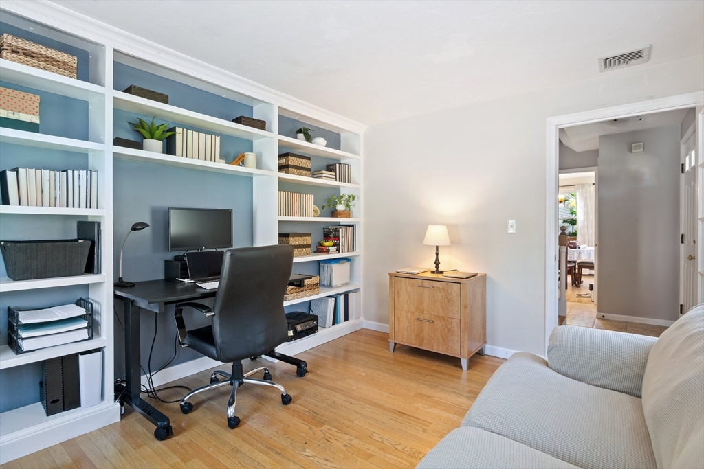 6 Wight Farm Road Natick, MA 01760 - Photo 12 of 37 a view of a livingroom with workspace and a couch