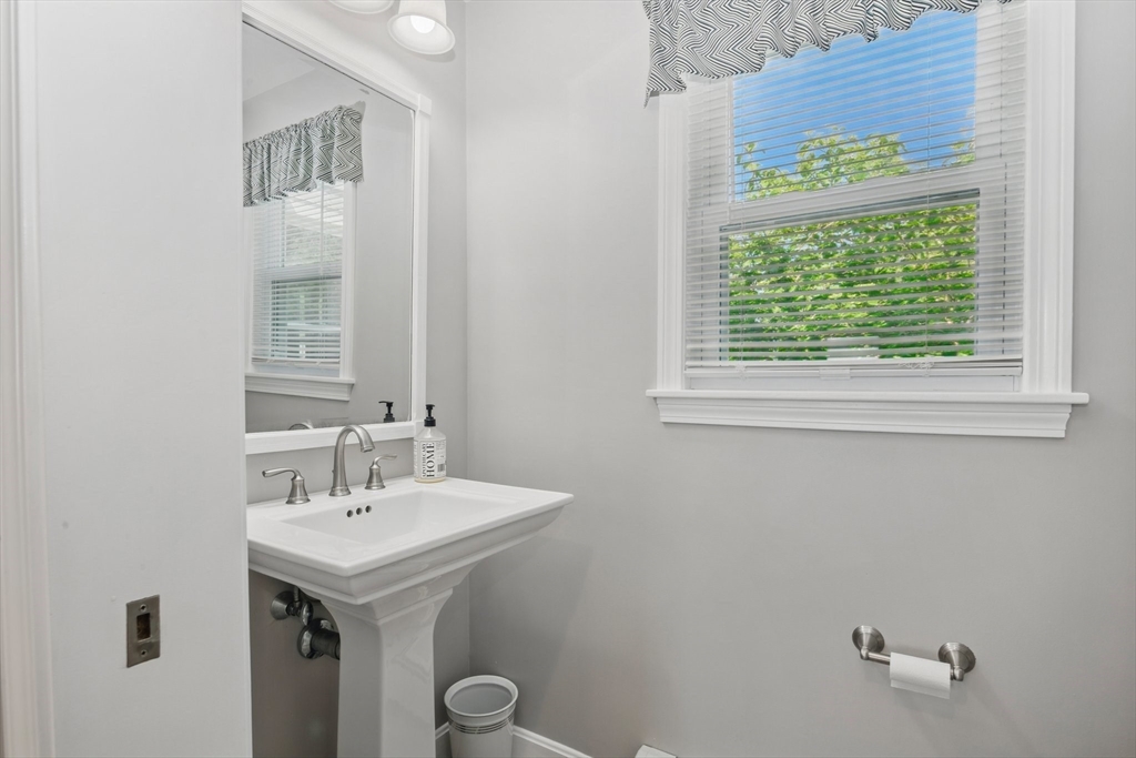 6 Wight Farm Road Natick, MA 01760 - Photo 15 of 37 a bathroom with a sink and a mirror