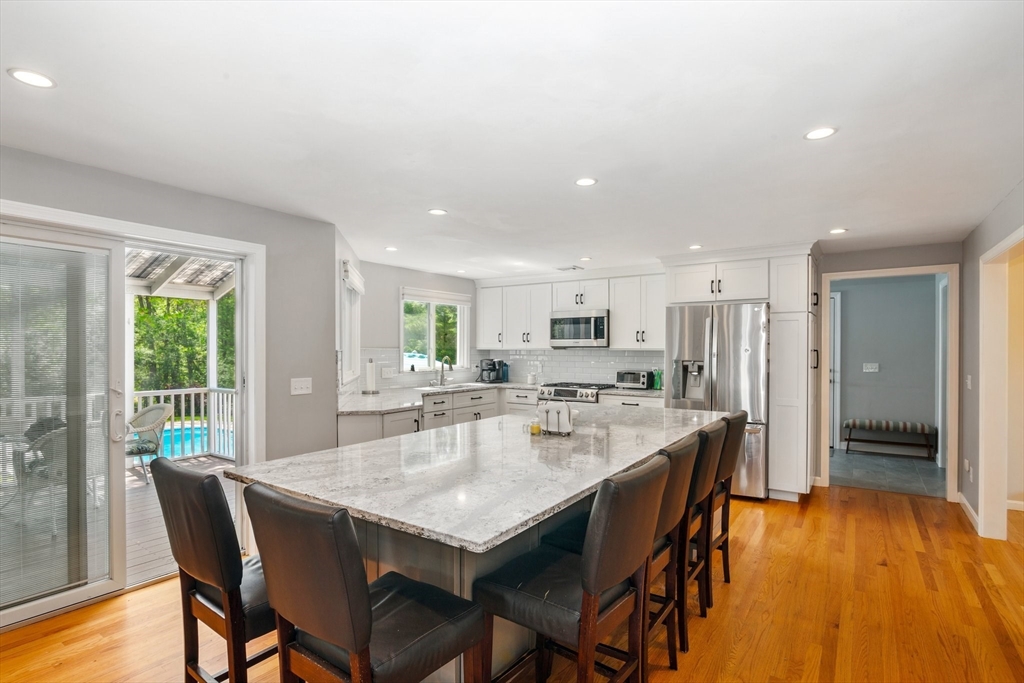 6 Wight Farm Road Natick, MA 01760 - Photo 2 of 37 a view of a dining room with furniture and wooden floor