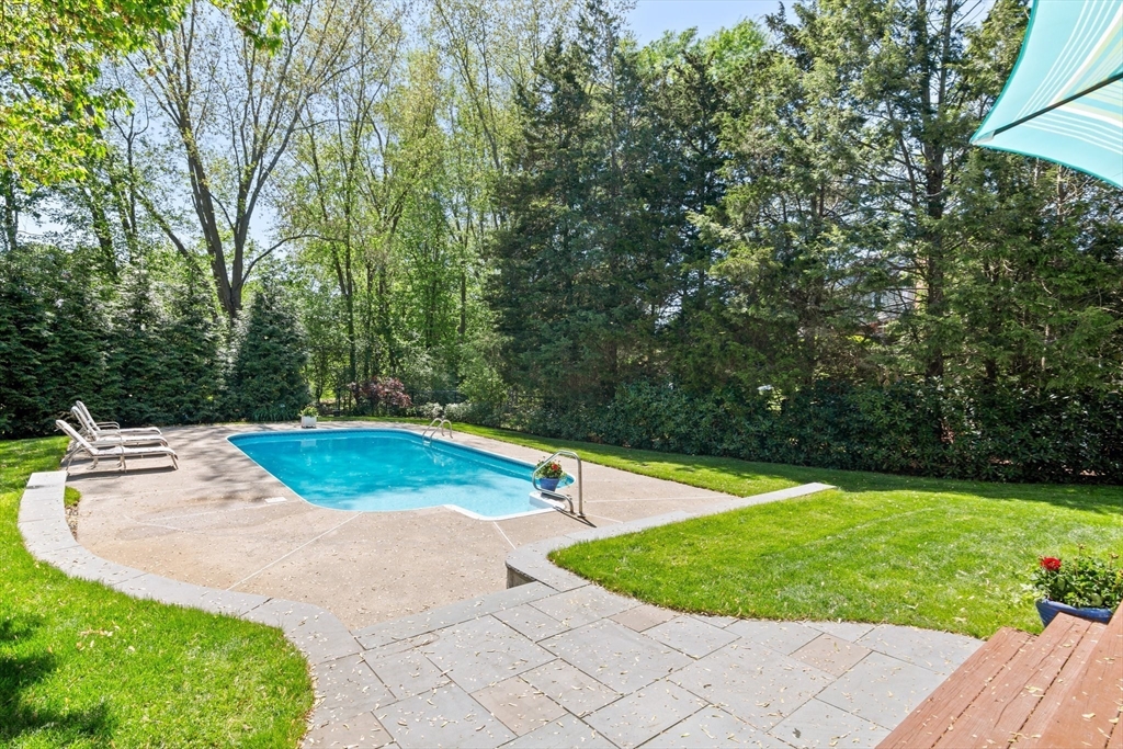 6 Wight Farm Road Natick, MA 01760 - Photo 28 of 37 a view of a swimming pool with a yard