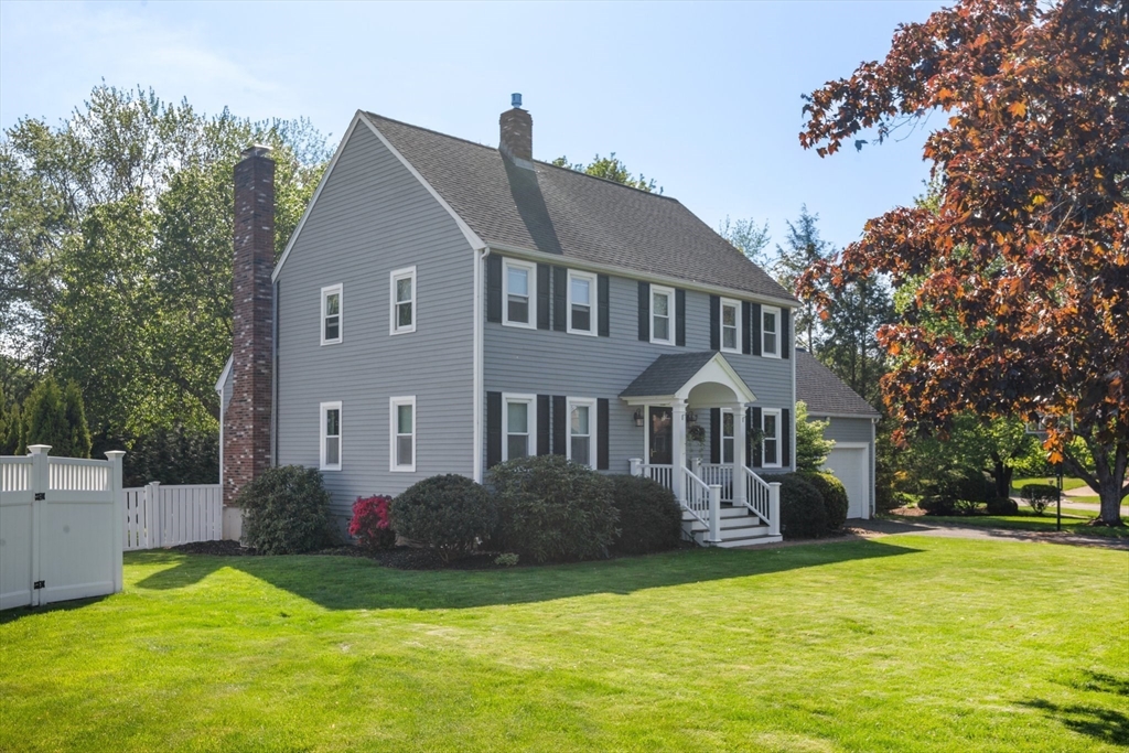 6 Wight Farm Road Natick, MA 01760 - Photo 32 of 37 a front view of a house with a yard
