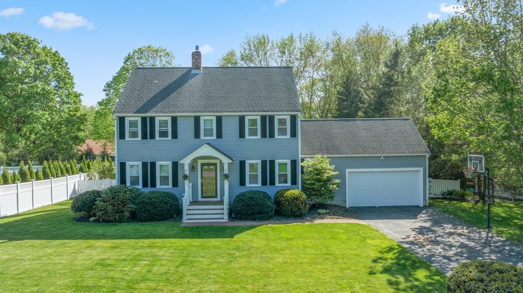 6 Wight Farm Road Natick, MA 01760 - Photo 34 of 37 front view of a house with a yard