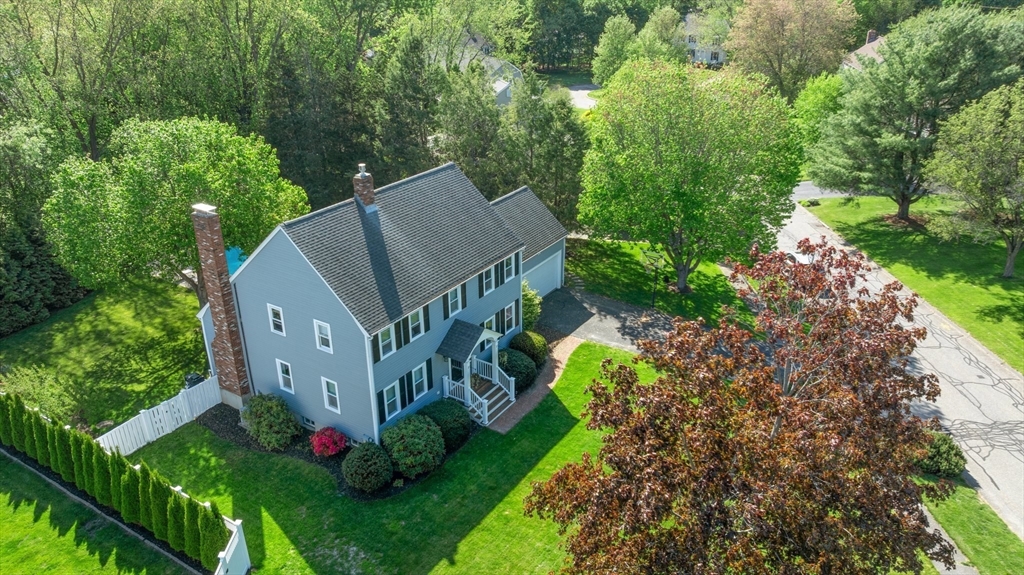 6 Wight Farm Road Natick, MA 01760 - Photo 36 of 37 a view of a house with a small yard and a garden