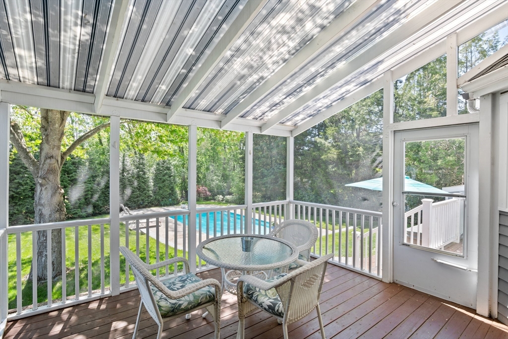 6 Wight Farm Road Natick, MA 01760 - Photo 8 of 37 a view of a chair and table in the balcony