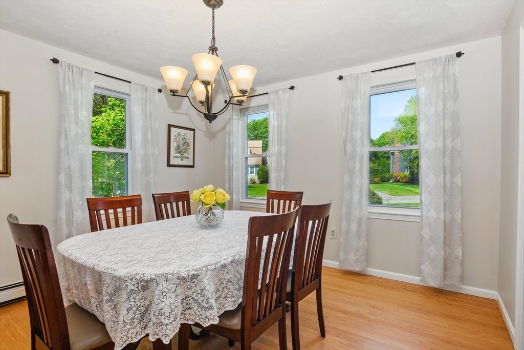 6 Wight Farm Road Natick, MA 01760 - Photo 9 of 37 a view of a dining room with furniture window and wooden floor
