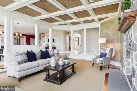 a large spacious bathroom with a granite countertop tub sink and mirror