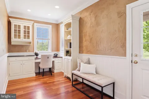 a bedroom with a bed and a table