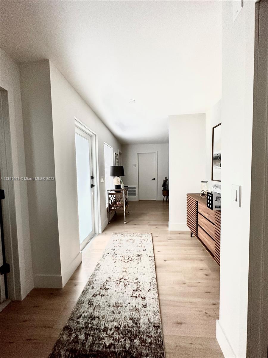 8949 Southwest 9th Street Boca Raton, FL 33433 - Photo 8 of 46 a living room with furniture and a rug