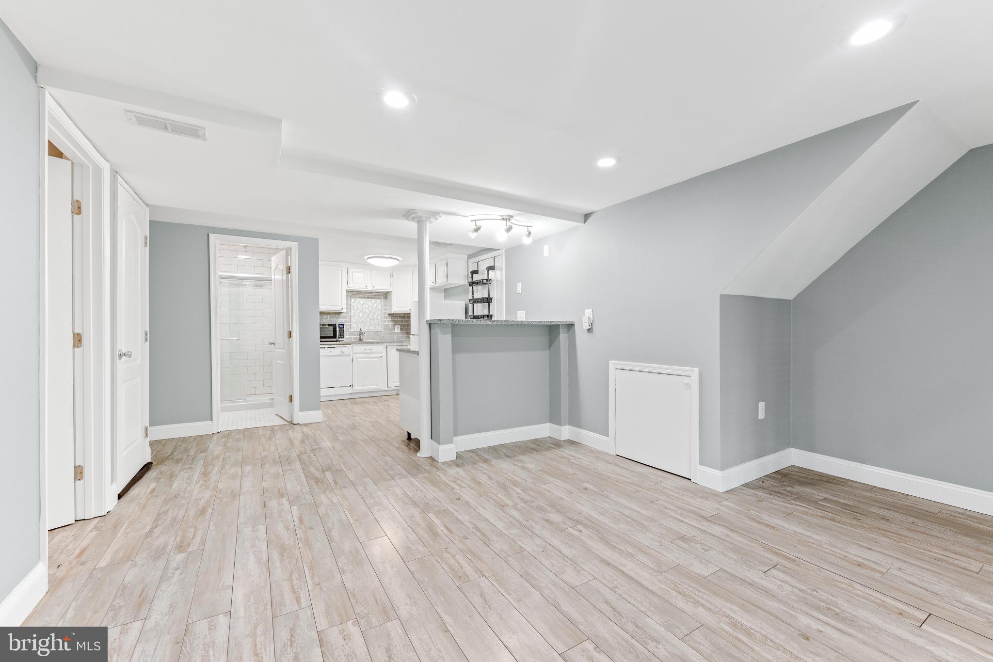 7140 Stone Throw Way Elkridge, MD 21075 - Photo 5 of 9 a view of a kitchen with wooden floor