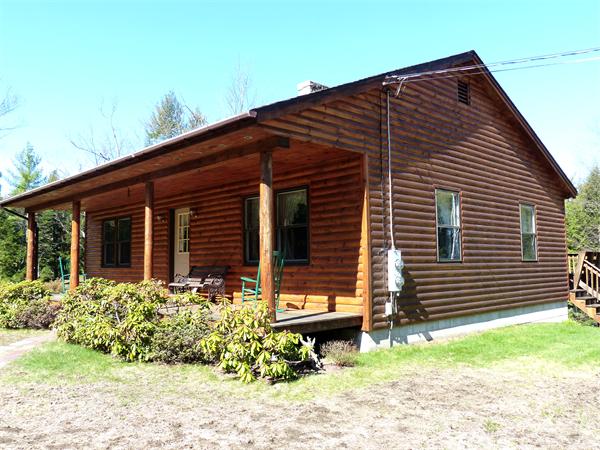 2039 B White Pond Road Athol, MA 01331 - Photo 1 of 28 a front view of a house with garden