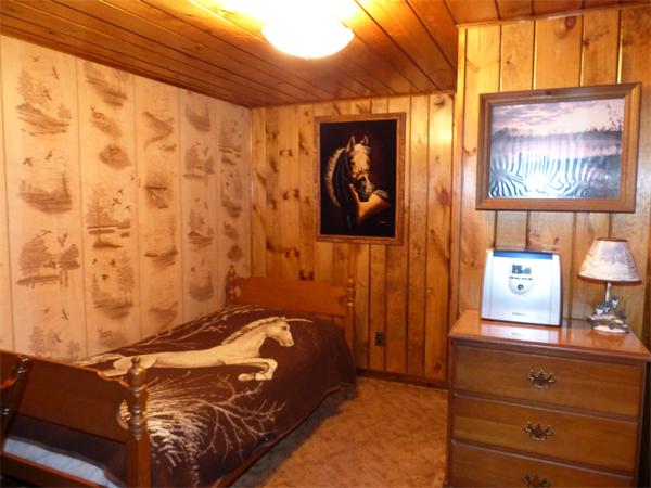 2039 B White Pond Road Athol, MA 01331 - Photo 12 of 28 a bedroom with a bed and a cabinet