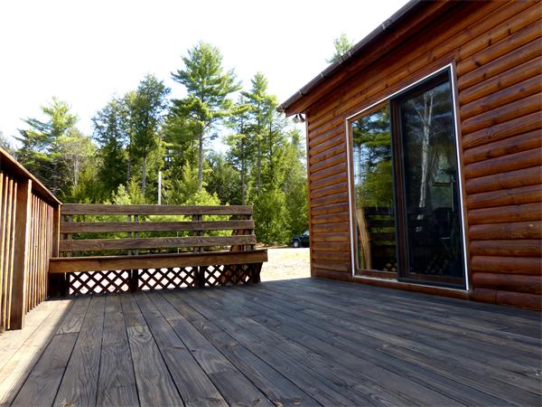 2039 B White Pond Road Athol, MA 01331 - Photo 17 of 28 a wooden bench sitting in front of a house