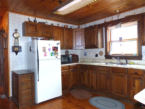 2039 B White Pond Road Athol, MA 01331 - Photo 6 of 28 a kitchen with refrigerator and window