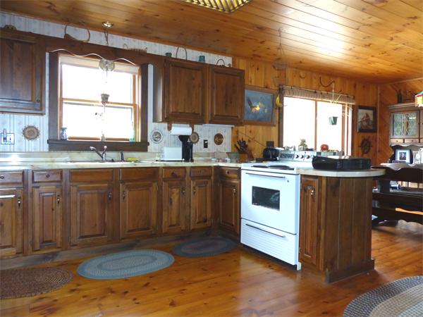 2039 B White Pond Road Athol, MA 01331 - Photo 7 of 28 a kitchen with a sink cabinets and window
