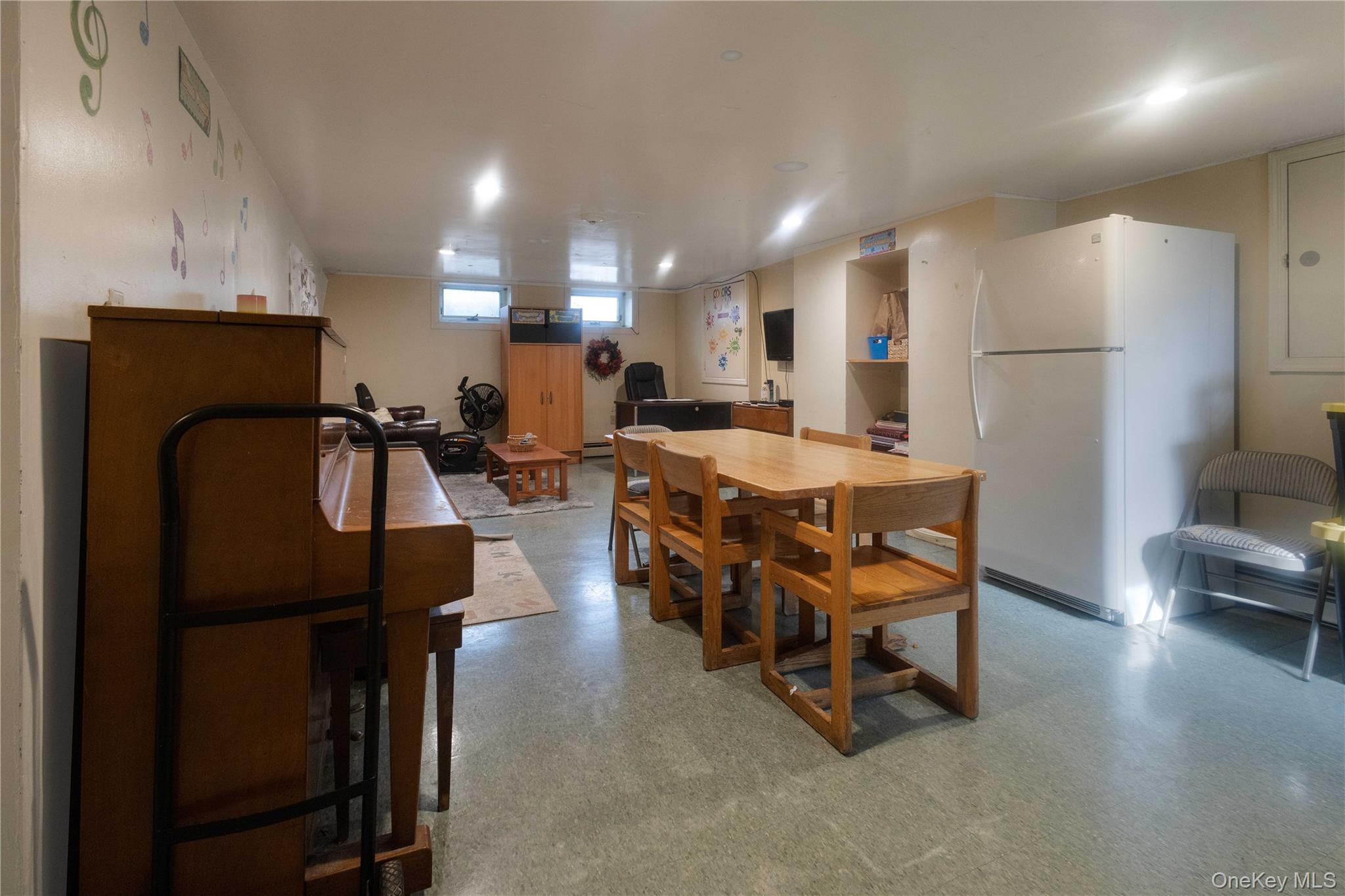 2 Old Cedar Swamp Road Jericho, NY 11753 - Photo 17 of 30 a large kitchen with a table and chairs