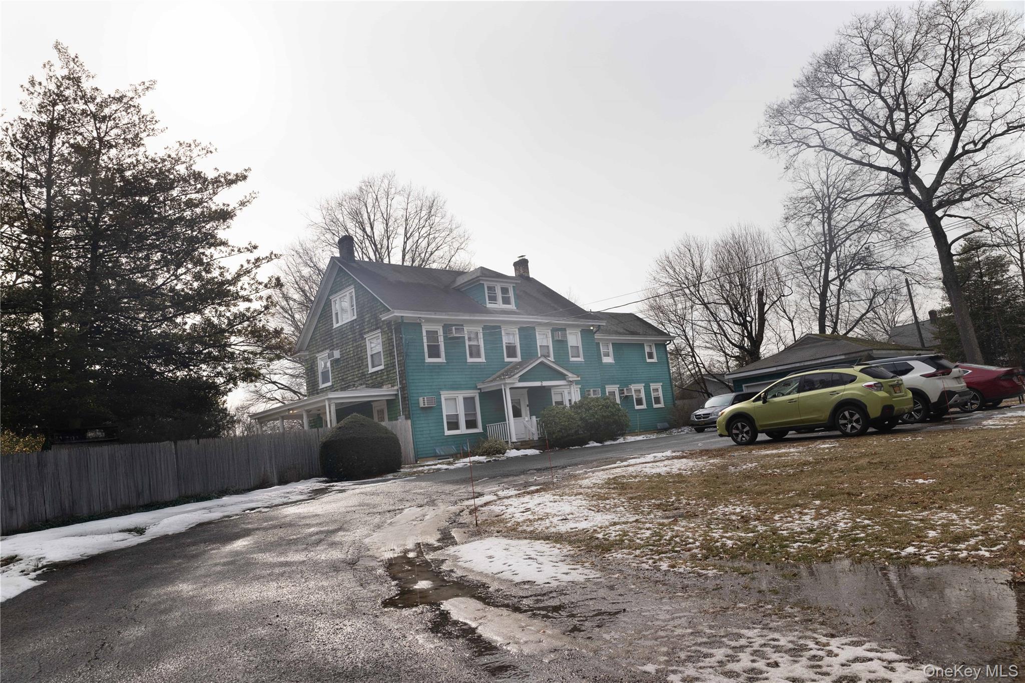 2 Old Cedar Swamp Road Jericho, NY 11753 - Photo 25 of 30 a house that has a tree in front of it