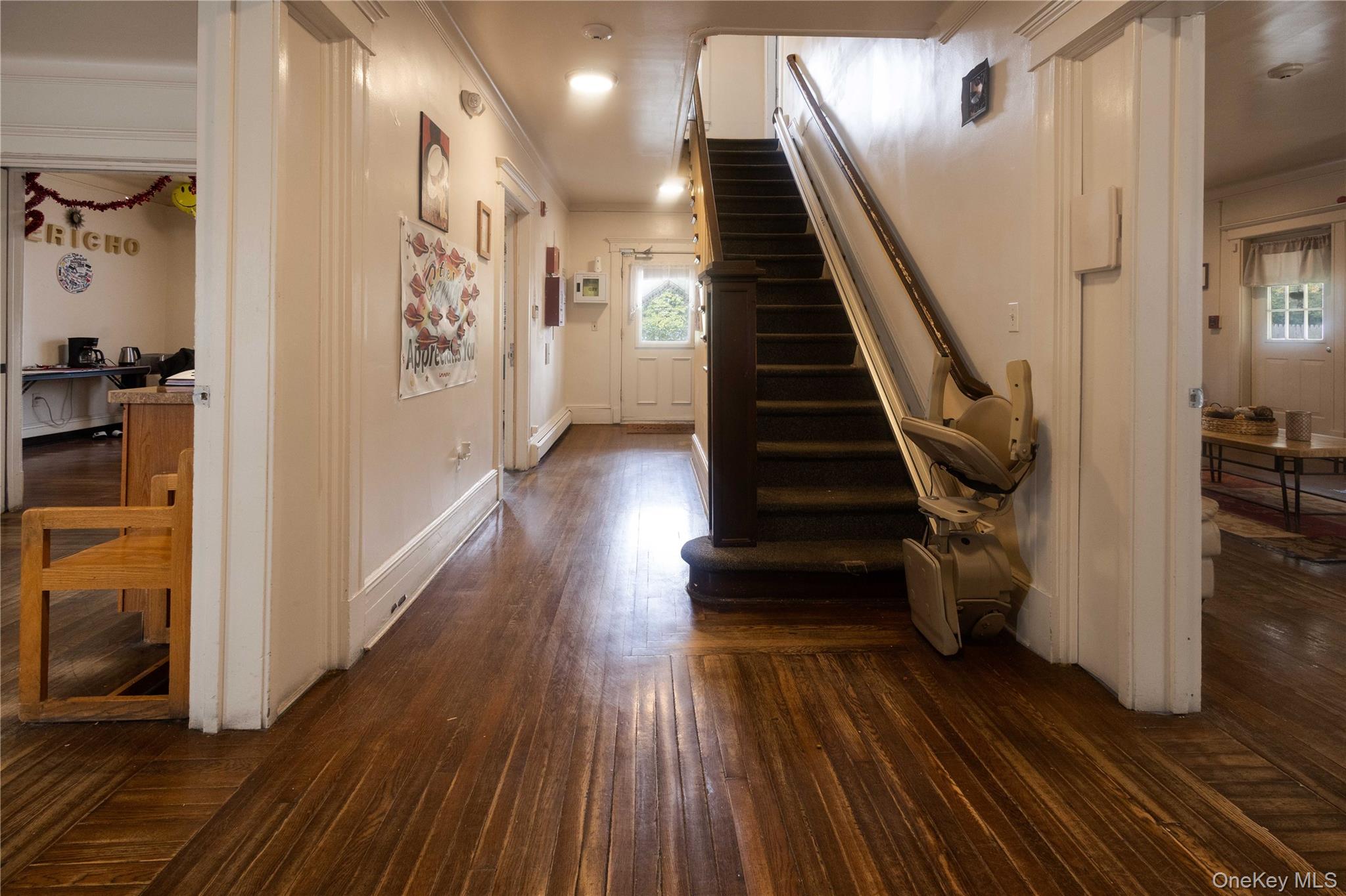 2 Old Cedar Swamp Road Jericho, NY 11753 - Photo 3 of 30 a view of entryway with wooden floor