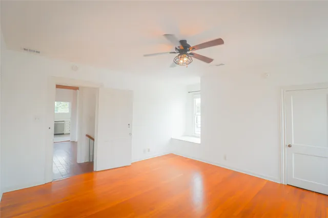 a view of a big room with carpet