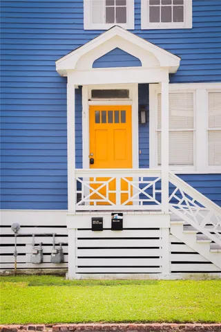 a view of front door with swimming pool