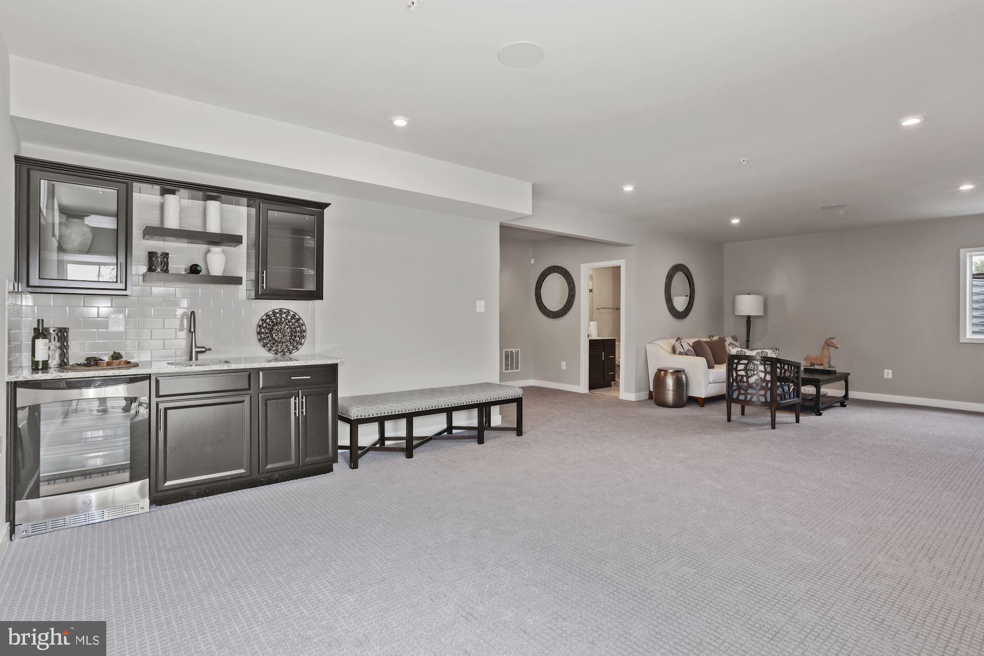 2934 Quarry Circle Odenton, MD 21113 - Photo 22 of 39 Lower level rec room with wet bar