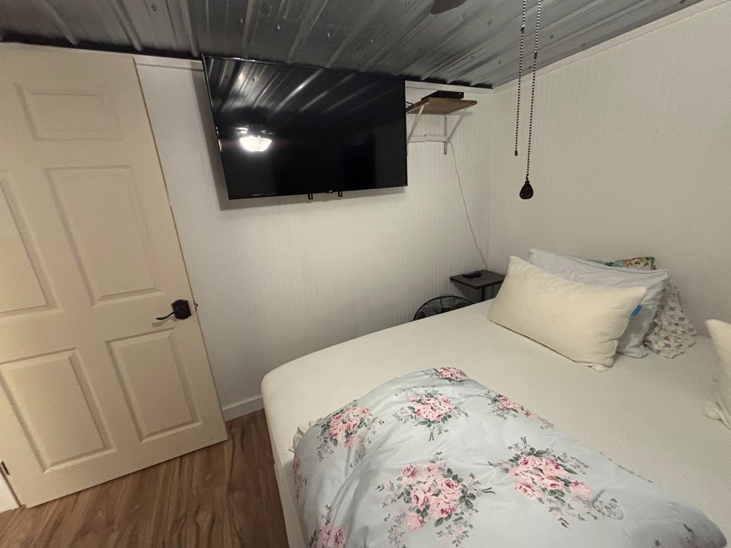 2043 Sd 45670 Rocksprings, TX 78880 - Photo 11 of 44 a bedroom with a bed and a flat screen tv