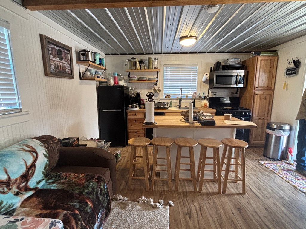 2043 Sd 45670 Rocksprings, TX 78880 - Photo 15 of 44 a dining room with furniture and wooden floor