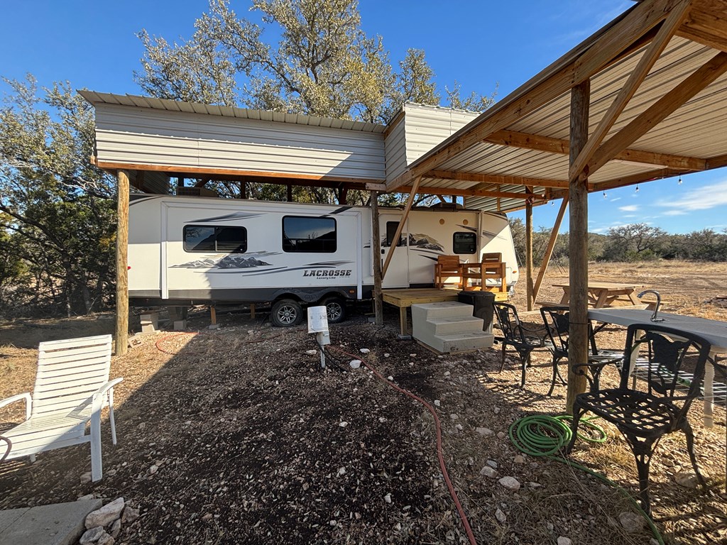 2043 Sd 45670 Rocksprings, TX 78880 - Photo 18 of 44 a view of a chairs and table in the patio