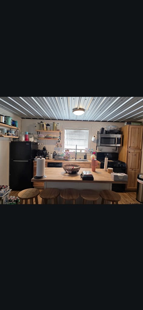 2043 Sd 45670 Rocksprings, TX 78880 - Photo 39 of 44 a kitchen with table and chairs